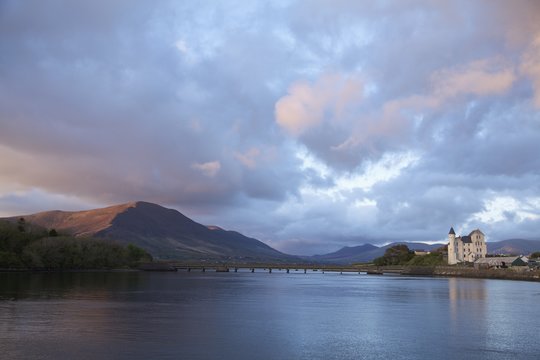 Caherciveen, County Kerry, Ireland; The Old Barracks Along The Water In The Evening