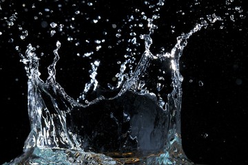 A Drop Of Water Landing And Splashing