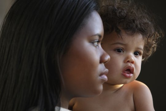 A Mother And Her Child; Troutdale, Oregon, United States Of America - Powered by Adobe