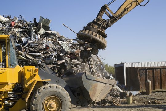 Items Being Pulled Off A Pile Of Materials For Recycling; Adamsville, Quebec, Canada