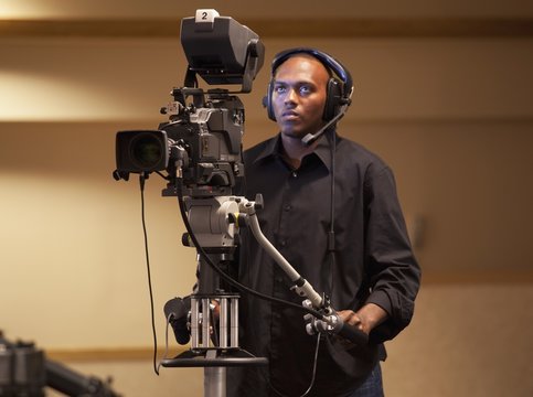 Fort Lauderdale, Florida, United States Of America; A Man Operating A Tv Camera