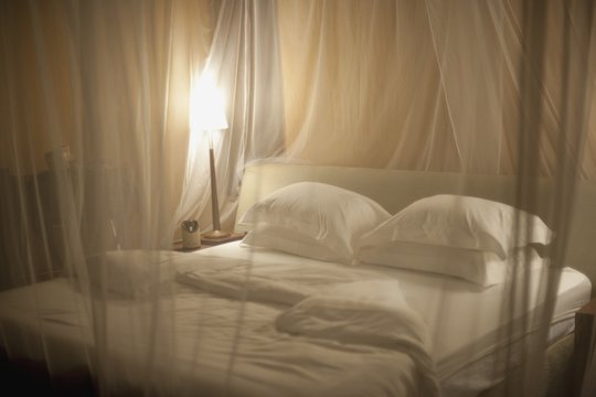 Bedding With Mosquito Netting, Kenya, Africa