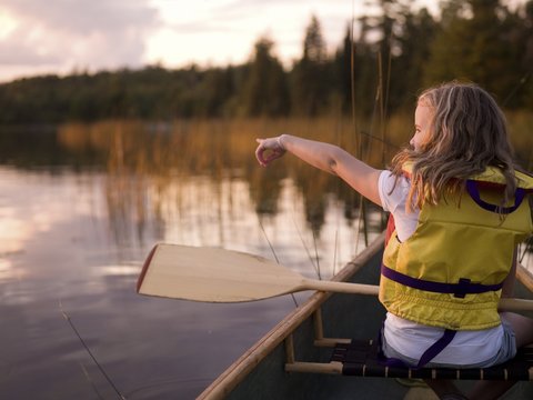 Lake Of The Woods, Ontario, Canada; Girl In A Canoe