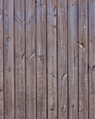 brown wood planks full of knobs background