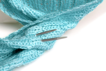 Piece of knitting work - blue yarn stitches - macro