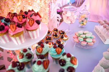 Candy bar. Table with sweets, candies, dessert