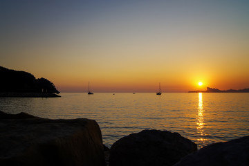 Sunset over the Mediterranean Sea. - obrazy, fototapety, plakaty