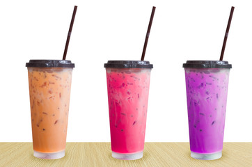 fresh sweet water colourful bright and ice in plastic glass isolated on white background,Summer drinks with ice on white background