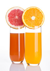 Glasses of healthy grapefruit  and orange juice