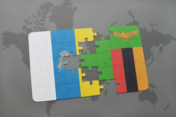 puzzle with the national flag of canary islands and zambia on a world map background.
