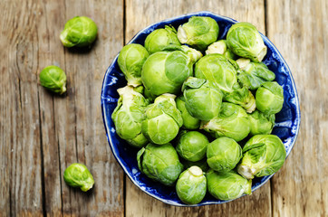 Brussels sprouts in a wooden bowl
