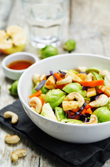 Brussels sprouts red cabbage carrot cashew apple salad with mapl