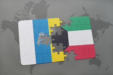 puzzle with the national flag of canary islands and kuwait on a world map background.