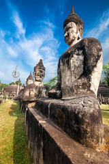 Fototapeta premium Amazing view of mythology and religious statues at Wat Xieng Khuan Buddha park. Vientiane, Laos