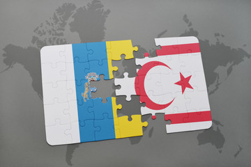 puzzle with the national flag of canary islands and northern cyprus on a world map background.