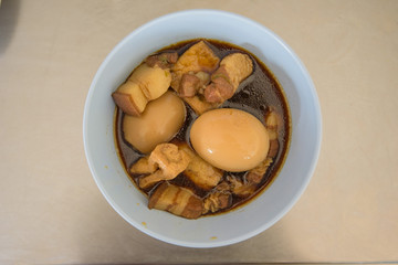 Eggs in brown sauce frogs and pork