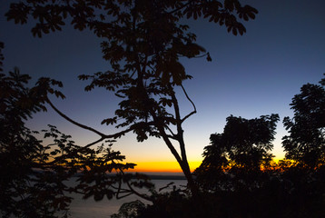 When the sun goes down behind the mountains. Lago Peten Itza, Guatemala