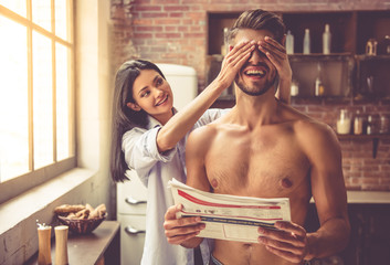 Sexy young couple in kitchen