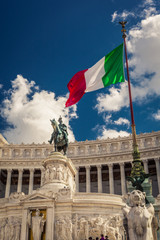 Fototapeta na wymiar Italian flag on the background of the Sculpture