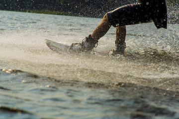 Wakeboarder trans in a cable park