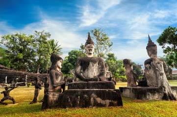 Fototapeta na wymiar Amazing view of mythology and religious statues at Wat Xieng Khuan Buddha park. Vientiane, Laos