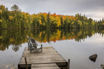 Empty Chairs on a Dock in Autumn - Ontario, Canada