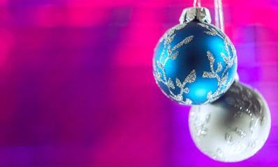 Silver and blue christmas ornaments with copy space