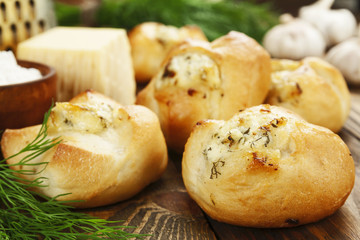 Baked buns stuffed with cheese and herbs