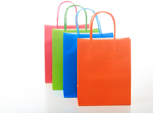 Colorful shopping bags on white background