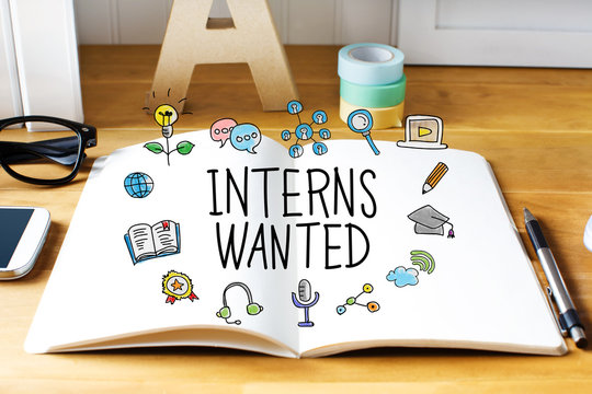 Interns Wanted concept with notebook