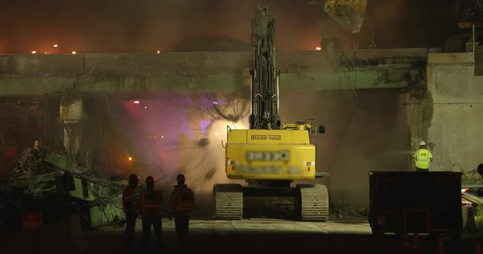 Bridge deconstruction worksite at night