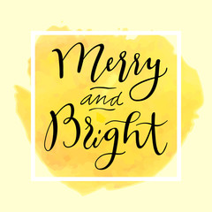 Merry and Bright. Modern calligraphy. Handwritten inspirational Merry Christmas quote. Watercolor calligraphic hand lettered greeting card  in yellow colors. Vector illustration