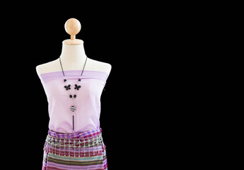A half length of Thai traditional dresses on mannequin with black background, identity culture of Thailand