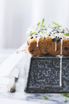 Iced berry cake with lemon verbena leaves