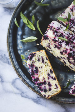 Iced berry cake with lemon verbena leaves