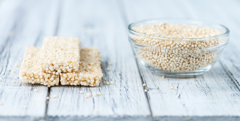 Quinoa Bars on a wooden table (selective focus)