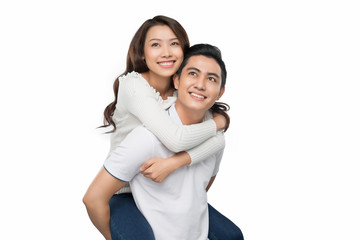 Happy asian couple isolated on white background. Cheerful young