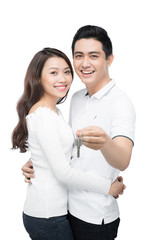 New home owners with key