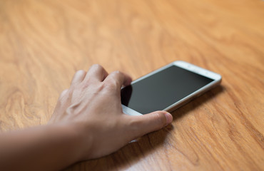 Smartphone on wood table