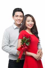 Asian man makes present to his lovely sweetheart. Young man givi