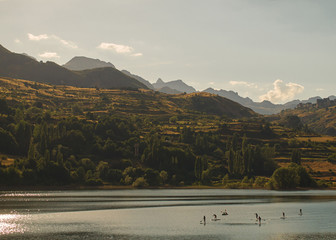 Paddle surf in lake