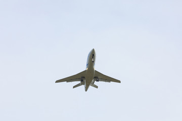 Bottom view airplane takeoff to the sky. the rise of the real aircraft in the sky.