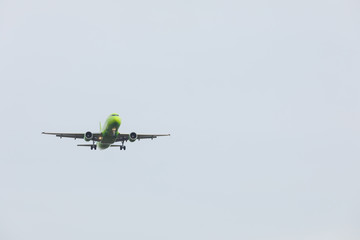 Bottom view airplane takeoff to the sky. the rise of the real aircraft in the sky.