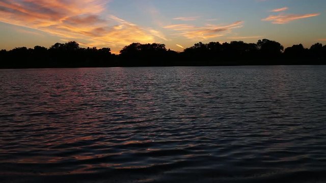 Lake at sunset, colorful sky, wide 