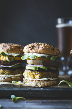 Spiced Zucchini, Feta and Chickpea Veggie Burgers with Minted Yogurt Sauce