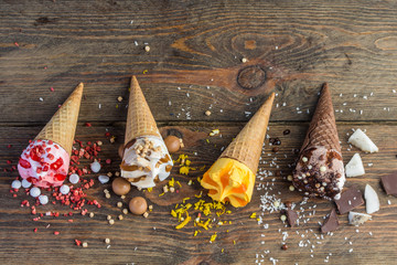 Ice cream cone on wooden table
