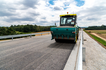 Road roller working on the construction site