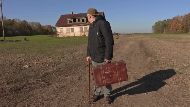 Disabled Man Walking Away From Home