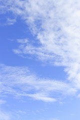 clouds in the blue sky background. over light