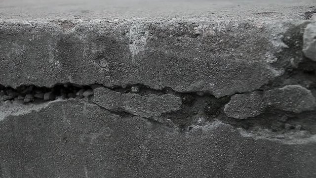 Close up of cracked concrete slab